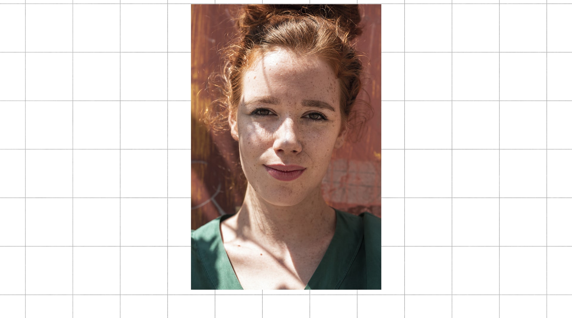 An image of a girl model with freckles before edit